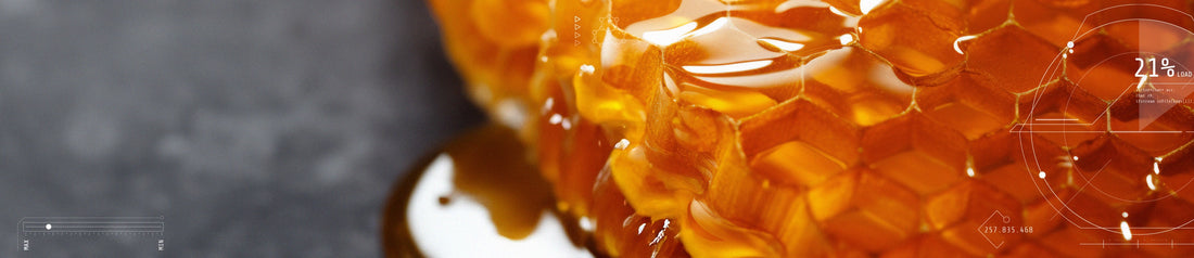 MBC Herbal Honey golden honeycomb dripping with therapeutic herbal honey for skin.